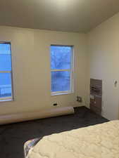 Unfurnished bedroom featuring carpet