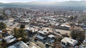 Birds eye view of property featuring a mountain view