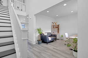 Living area featuring light hardwood / wood-style floors