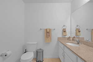 Bathroom with vanity and toilet