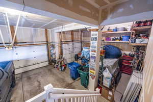 Extra tall ceilings in this 3 car garage