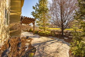 View of patio with a pergola