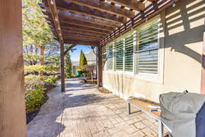 Stamped patio running the length of the back of house