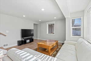 Living room featuring light hardwood / wood-style flooring