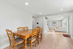 Dining space featuring light hardwood / wood-style floors