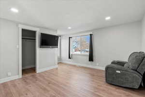 Unfurnished room with light hardwood / wood-style floors