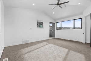 2nd primary bedroom featuring large windows and open concept bathroom.