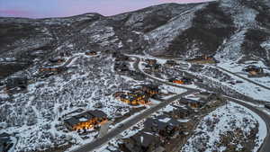 Snowy aerial view featuring a mountain view