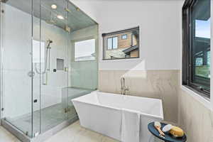 1st Primary Bathroom with large tub and walk in shower.