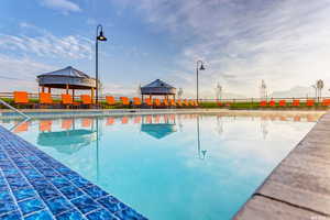 View of swimming pool featuring a gazebo