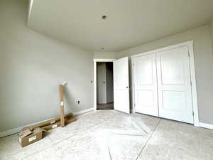 Unfurnished bedroom featuring a closet