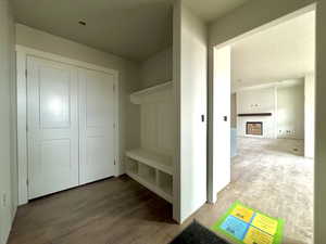 Mudroom with hardwood / wood-style floors