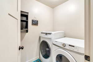 Laundry room with separate washer and dryer