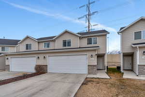 View of front facade with a garage