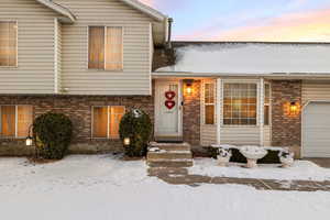 View of front of property featuring a garage