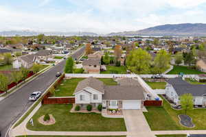 Drone / aerial view featuring a residential view and a mountain view