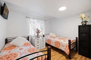 Bedroom featuring light wood-type flooring