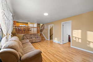 Living room featuring light hardwood / wood-style flooring