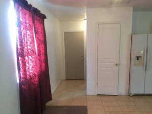 Hallway to bedroom and bathroom of attached Mother-in-law apartment.