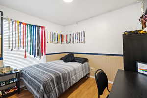 Bedroom featuring hardwood / wood-style floors