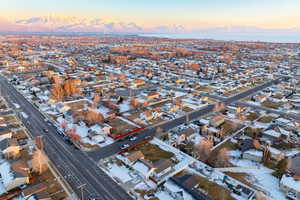 Aerial view at dusk featuring a mountain view