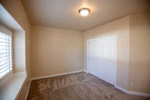 Bedroom #2 featuring a closet and carpet