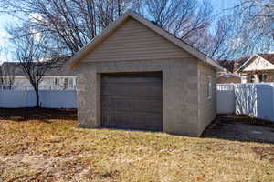 View of rear shed for workshop or lawn maintenance.