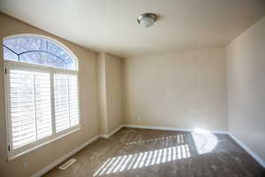 Front main bedroom #1 with large window and lots of natural light