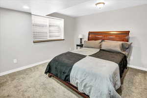 Bedroom featuring carpet flooring