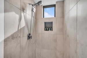 Interior space with tiled shower