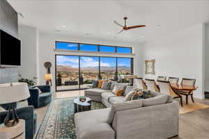 Living room featuring ceiling fan