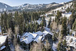 Snowy aerial view with a mountain view