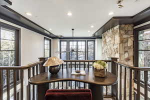 Dining area with crown molding