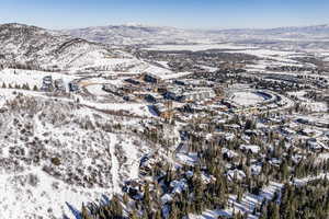 Snowy aerial view with a mountain view