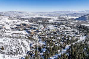 Snowy aerial view with a mountain view