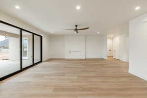 Unfurnished room featuring light hardwood / wood-style floors and ceiling fan