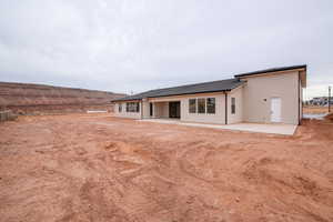 Back of house featuring a patio area