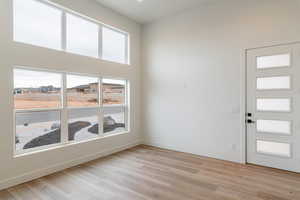 Foyer entrance featuring light wood-type flooring