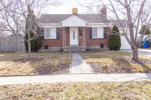 Bungalow-style home with a garage