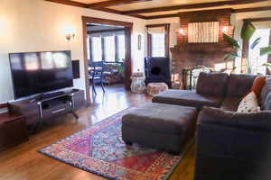 Living room featuring  brick fireplace