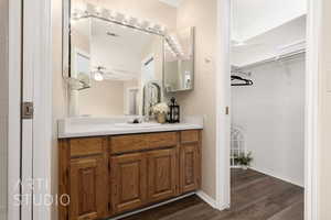 Bathroom with vanity and hardwood / wood-style flooring