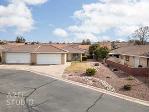 Ranch-style house featuring a garage