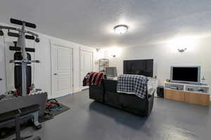 Living room with a textured ceiling