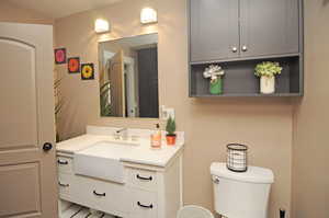 Bathroom with vanity and toilet