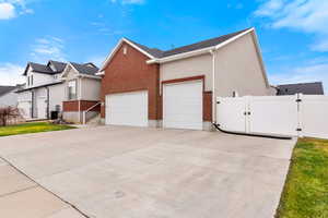 View of side of property featuring a garage