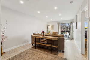 Living room featuring light hardwood / wood-style flooring