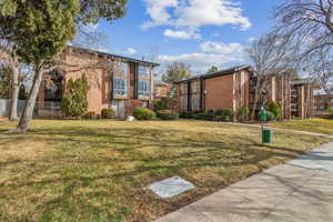 Exterior space featuring a lawn