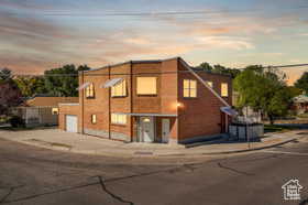 View of front of property featuring a garage