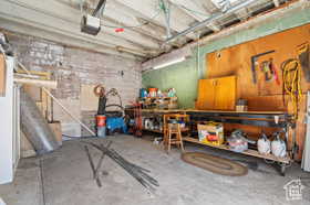 Garage featuring a workshop area