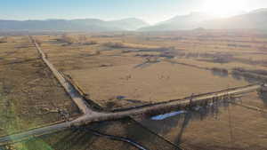 Drone / aerial view featuring a mountain view and a rural view